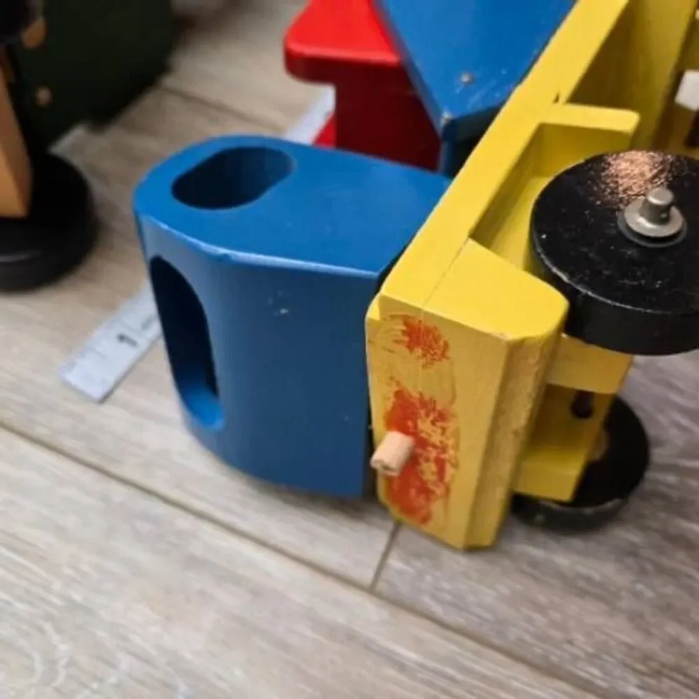 2 vintage Romania toy wooden trucks colorful, moving parts collectible